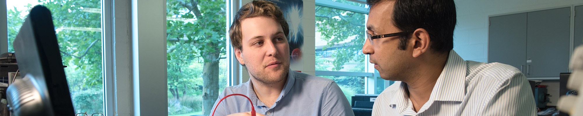 A student being mentored by a professor